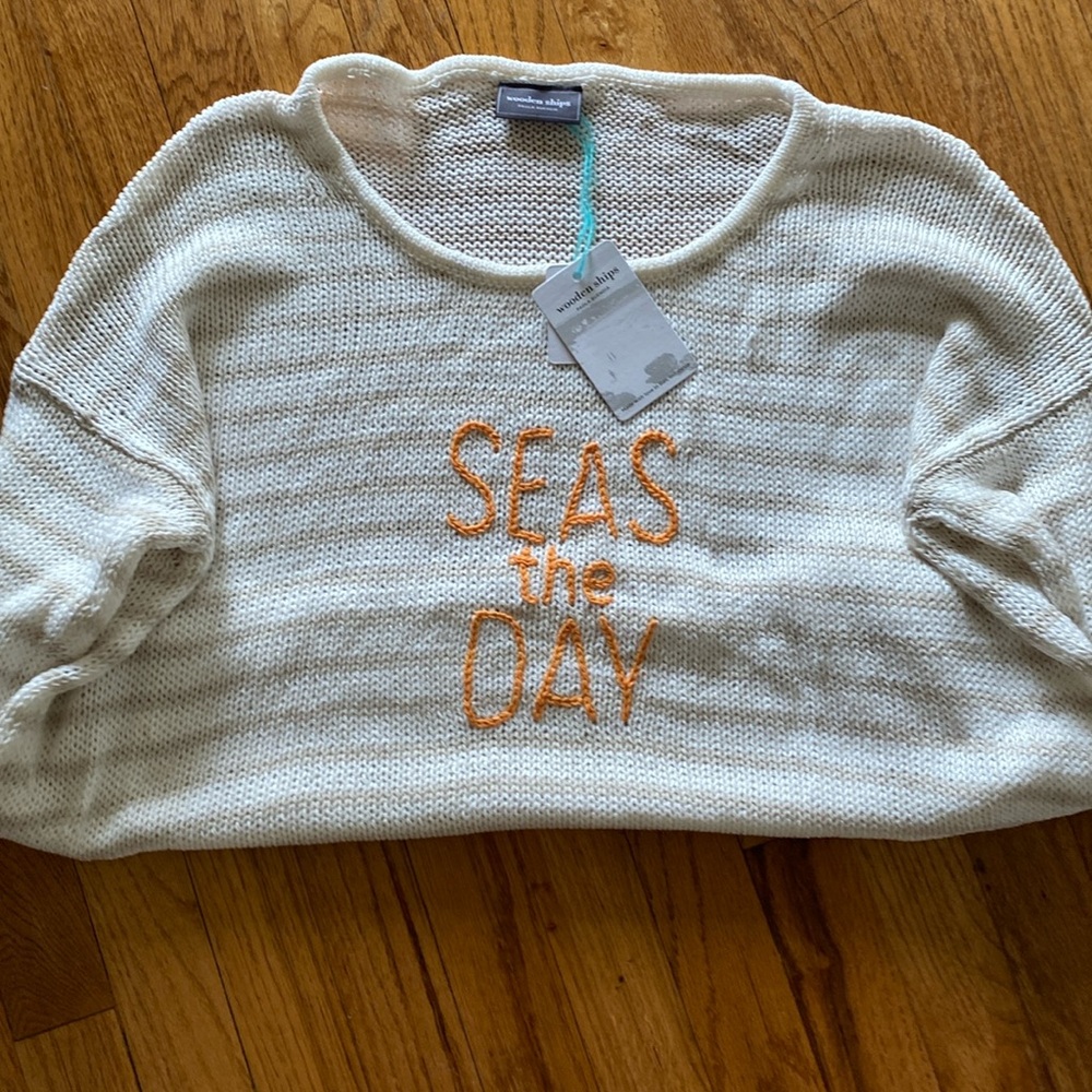 Great light sweater. Brown and white stripe. Seas the day nautical.